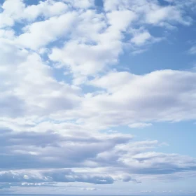 Peaceful Blue Sky with White Clouds