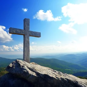 Cross Overlooking Mountain Landscape