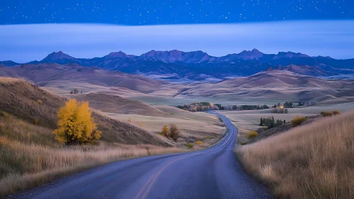 Winding Road to Mountains at Night