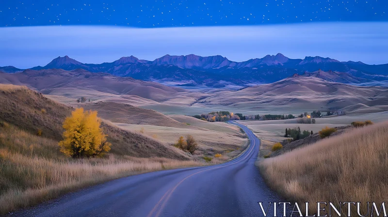 Winding Road to Mountains at Night
