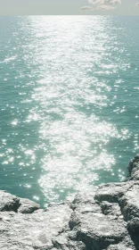 Sparkling Sunlight Over Tranquil Ocean