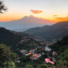 Sunset Over Mountain Valley Town