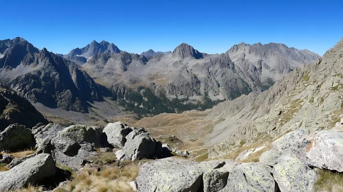 Rocky Peaks Under Clear Blue Sky