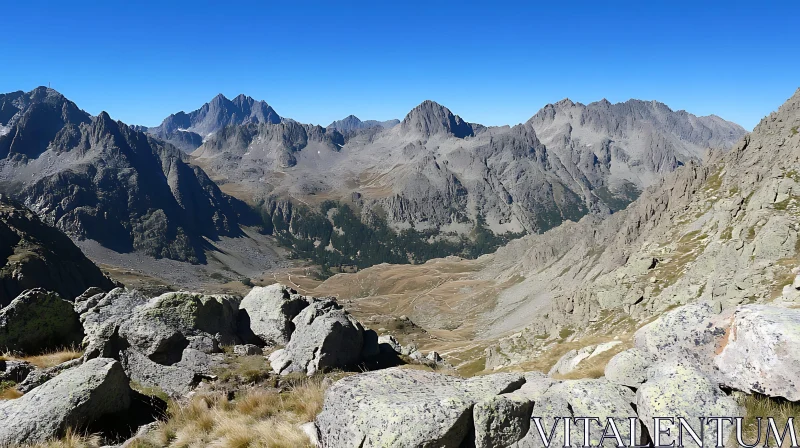 Rocky Peaks Under Clear Blue Sky AI Image