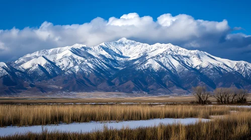 Winter Mountain Scene with Blue Sky