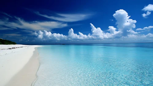 Serene Beach with Azure Water and Clouds