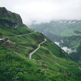 Winding Road in Verdant Mountain Landscape