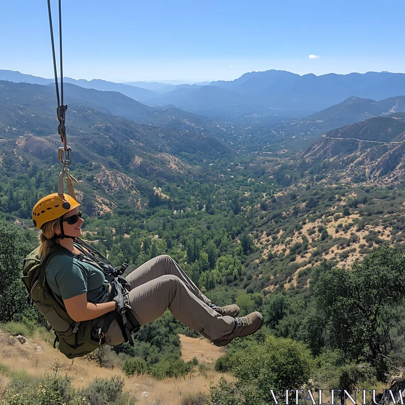 Woman Ziplining Through Mountain Landscape