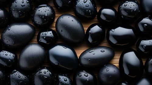 Monochrome Still Life - Black Pebbles with Water Droplets