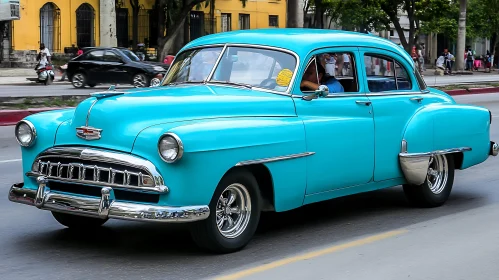 Retro Turquoise Blue Chevrolet Car in Motion