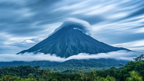 Mystical Mountain Scene with Forest and Clouds