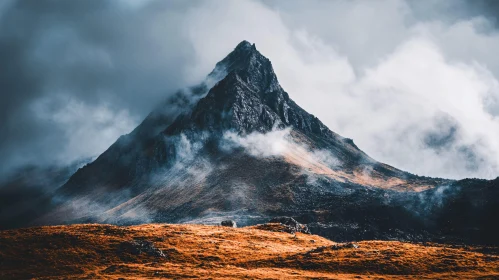 Mystical Fog Encircling a Majestic Mountain