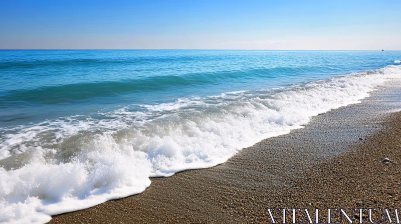 Serene Coastal View of Waves Meeting the Shore