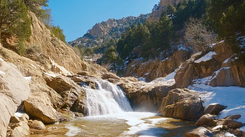 Tranquil Mountain Waterfall with Snow and Trees