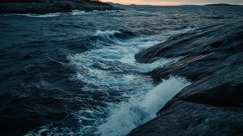 Waves Crashing Against Rocky Coastline at Sunset