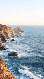 Rugged Cliffs and Tranquil Ocean at Dusk