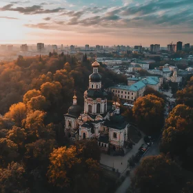 Historic Church and Cityscape with Autumnal Foliage