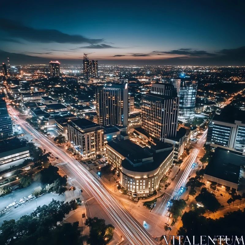 Urban Nightscape with Illuminated Buildings and Car Light Trails