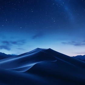 Serene Night Sky Over Blue-Hued Sand Dunes