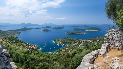 Scenic Island Landscape with Green Hills and Sailboats