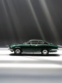 Vintage Green Automobile on Reflective Surface