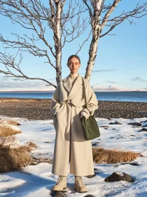 Stylish Winter Wear Amidst Snow and Lake