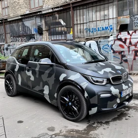 Stylish Urban Electric Car with Camouflage Wrap