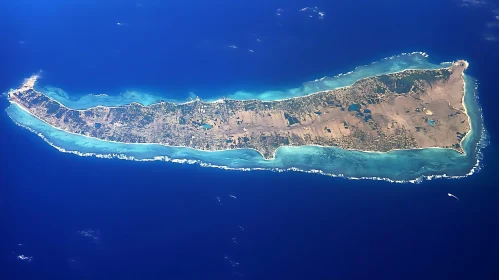 Elongated Tropical Island Encircled by Reef