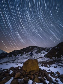 Celestial Trails Above Majestic Peaks