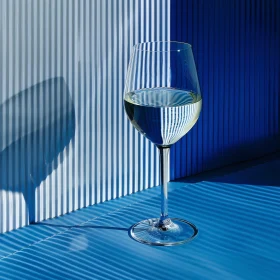 Intriguing Light Patterns Through a White Wine Glass