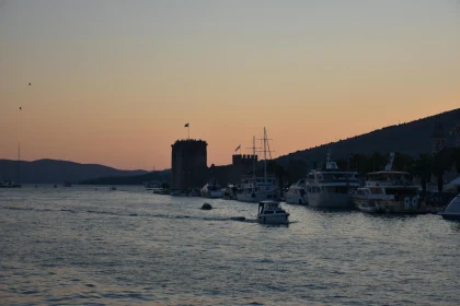 Sunset Over Croatian Harbor with Boats