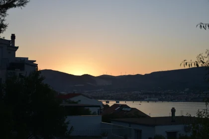 Sunset Glow Over Hills and Town