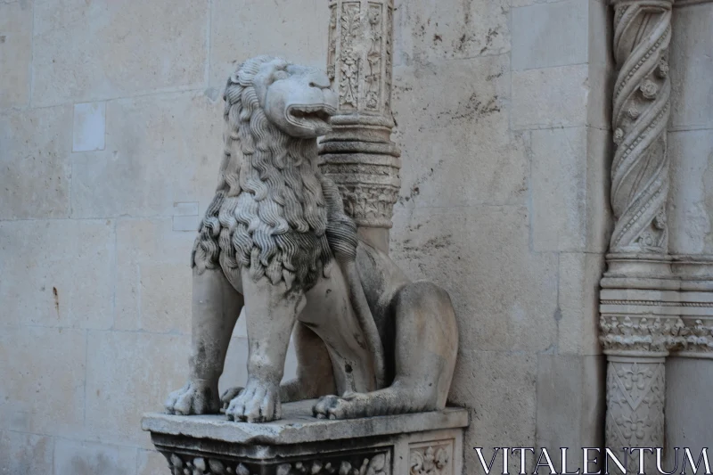 PHOTO Ornate Stone Lion in Architectural Setting