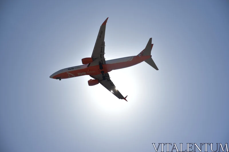 PHOTO Passenger Plane in Halcyon Skies