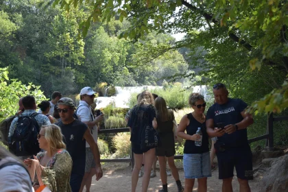 Tourist Group at Waterfall