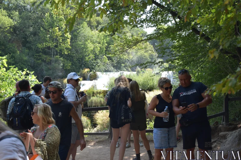 Tourist Group at Waterfall Free Stock Photo