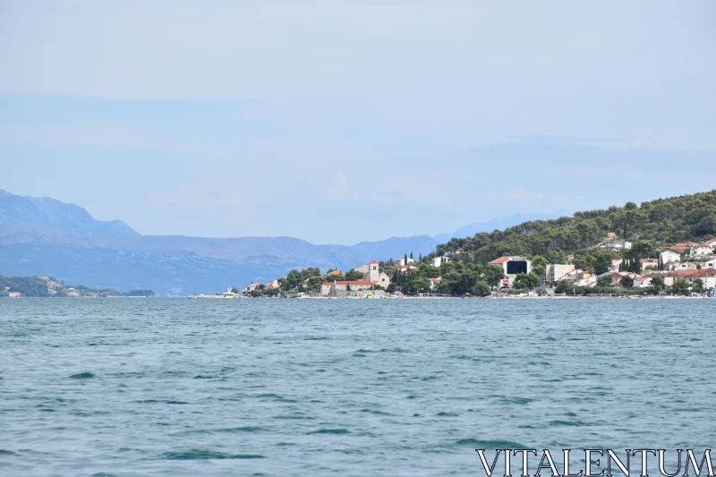 Serene Croatian Shoreline View Free Stock Photo