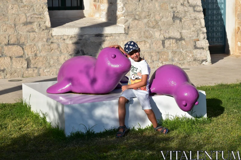 PHOTO Child with Purple Seal Art