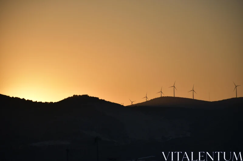 PHOTO Sunset Over Wind Turbine Hills