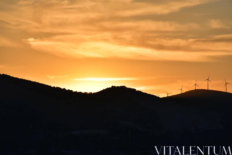 Golden Horizons with Wind Turbines Free Stock Photo