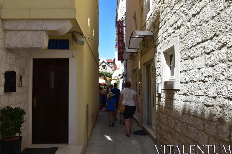 Charming City Alley Adventure Free Stock Photo