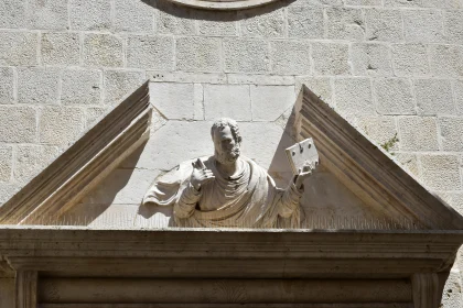 Classical Stone Sculpture with Book