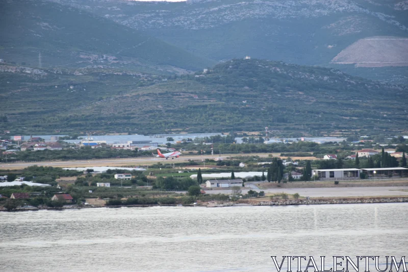 Serene Mountain Airport Scene Free Stock Photo