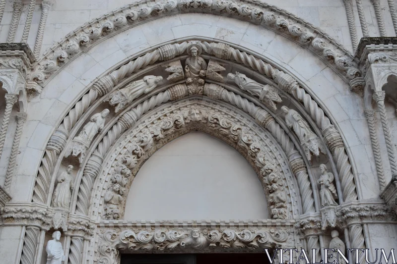 PHOTO Historical Stone Carvings on Archway