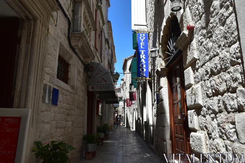 Historic City Alley with Restaurants Free Stock Photo