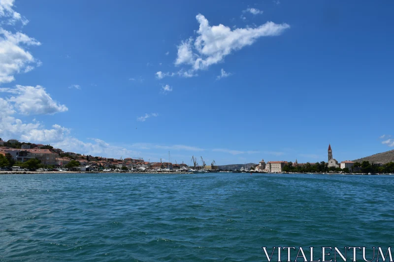 Scenic Shoreline of a Coastal Town Free Stock Photo