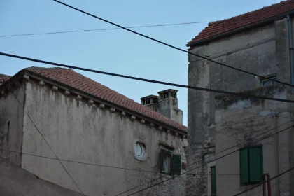 Historic Urban Scene with Red-Tiled Roofs