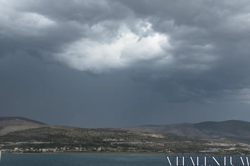 Stormy Coastline with Mountains Free Stock Photo