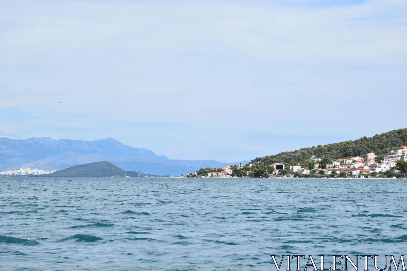 Scenic Coastline and Mountain View Free Stock Photo