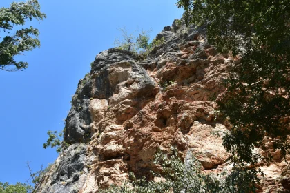 Sunlit Cliff and Clear Blue Sky